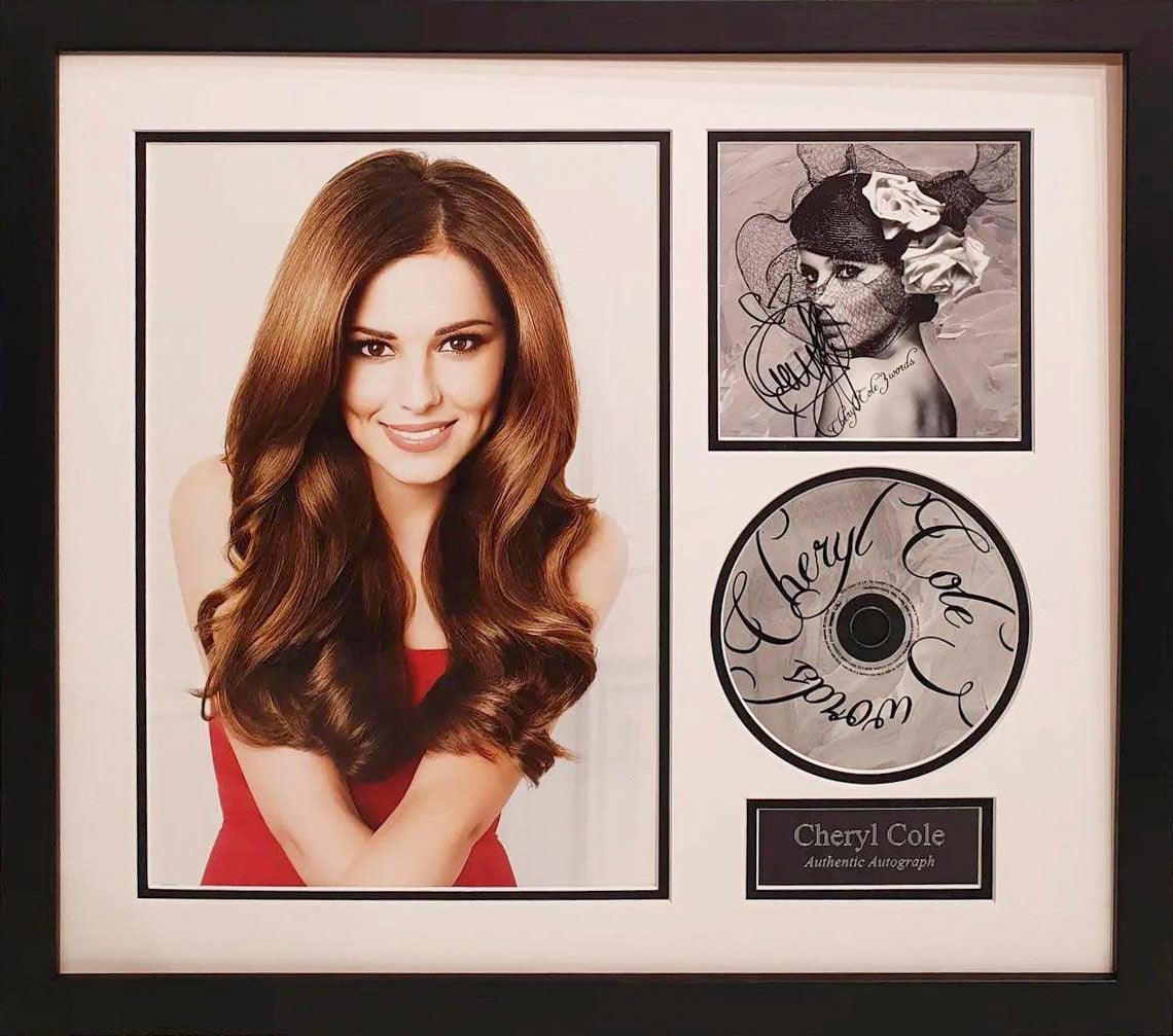 Cheryl Cole signed album cover, framed with Certificate of Authenticity (COA).